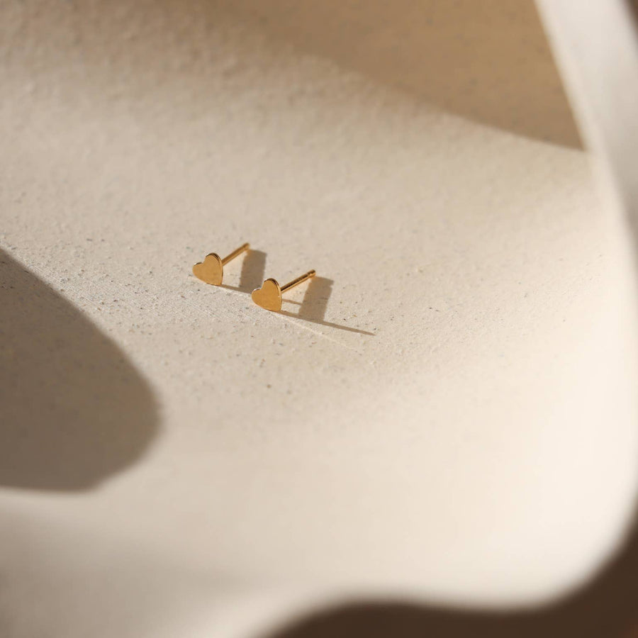 Token Tiny Heart Studs