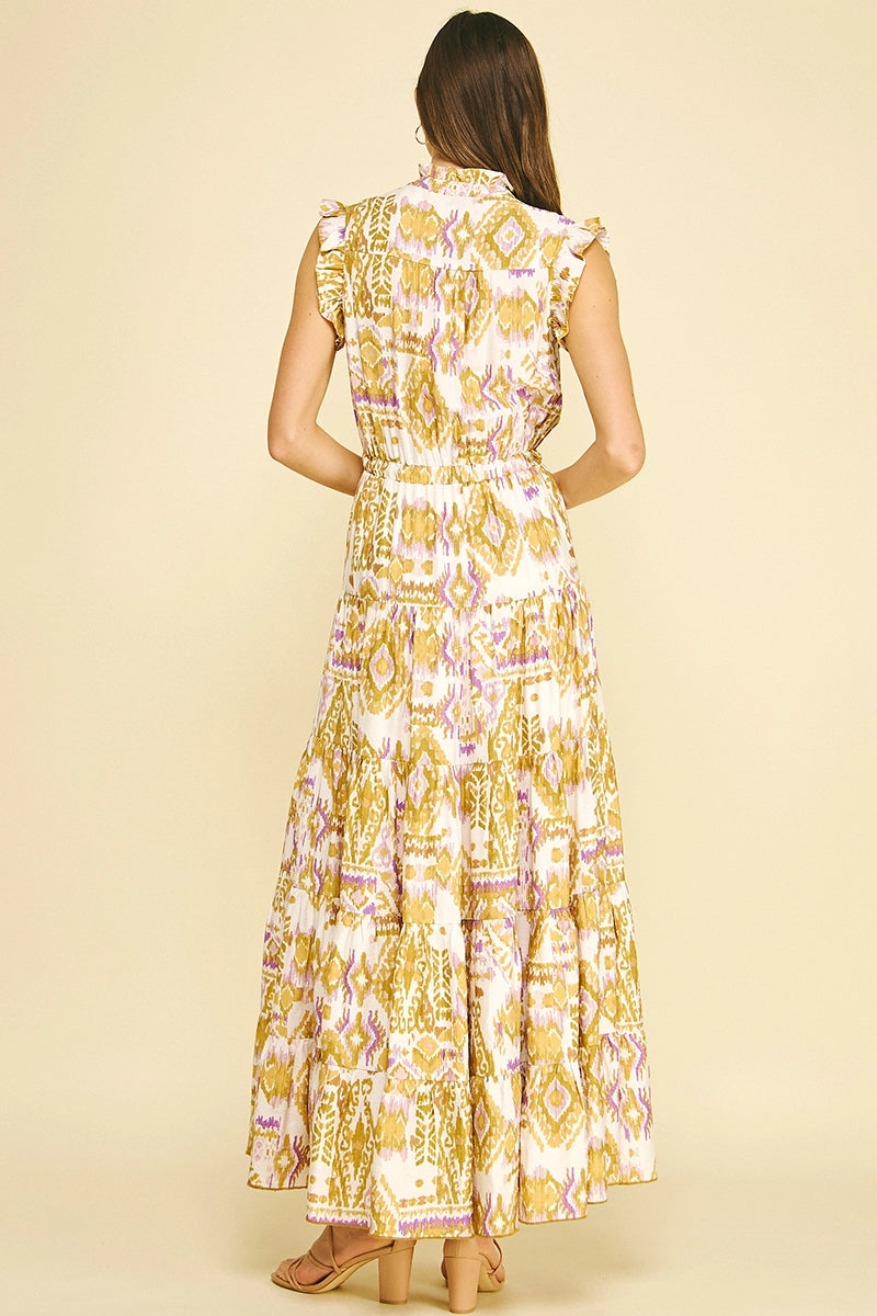 Woman wearing a patterned dress on a beige background