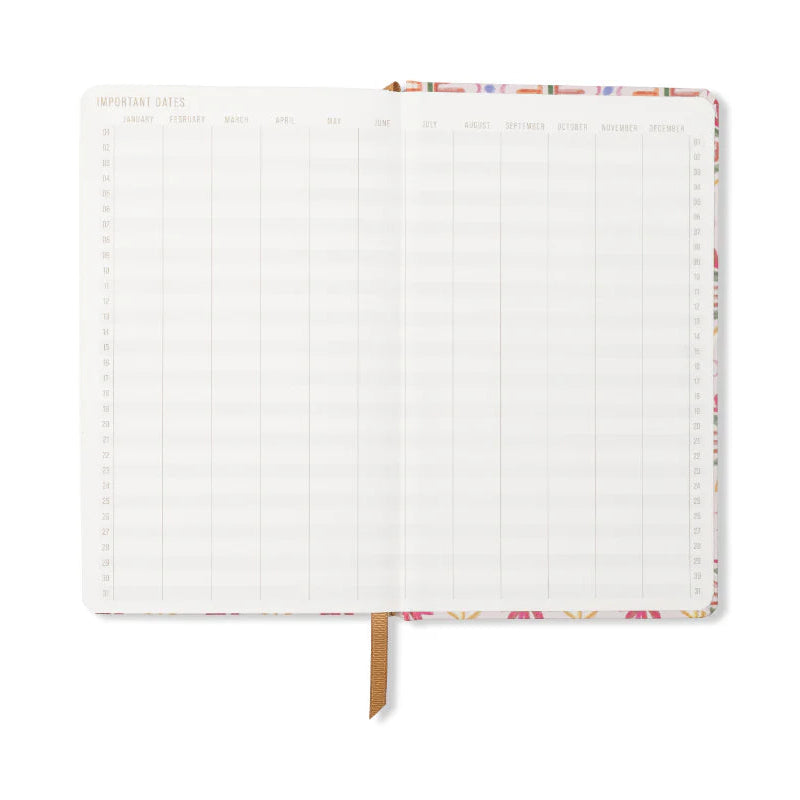 White notebook with floral edge on a white background